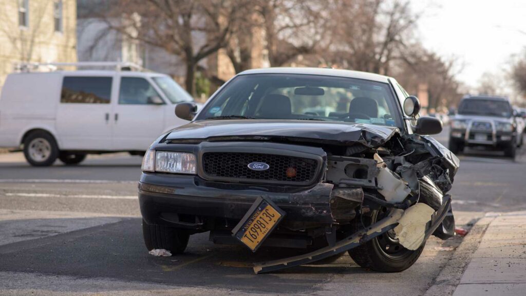 For vehicle from New York smashed on one side after a traumatic car accident